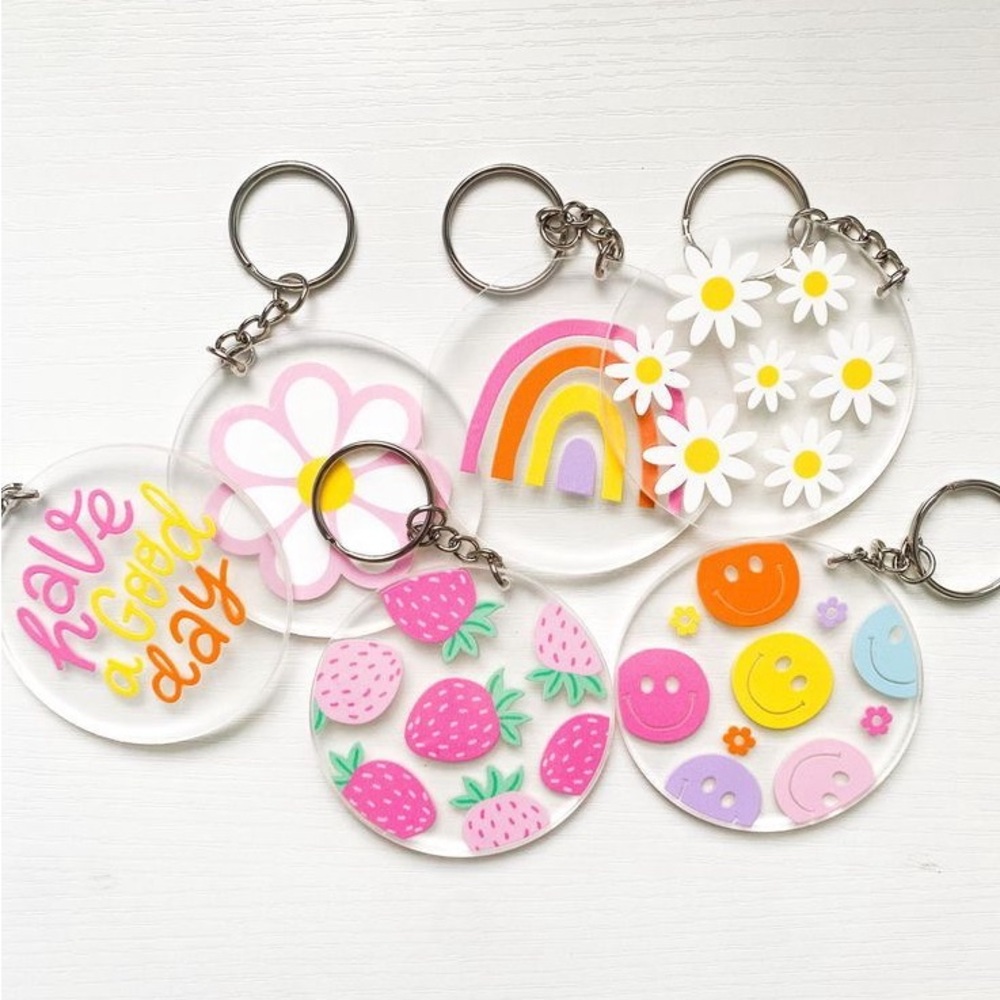 Vibrant Kids Keychain Set with Rainbow and Smiley Designs